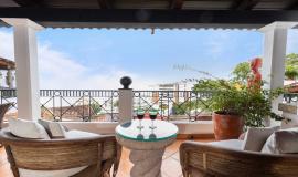An exceptional 2-level condominium with exquisite Hacienda-style decoration.